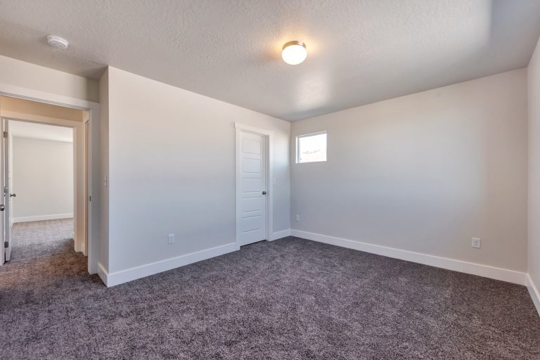 Bedroom in a new home from McArthur Homes.