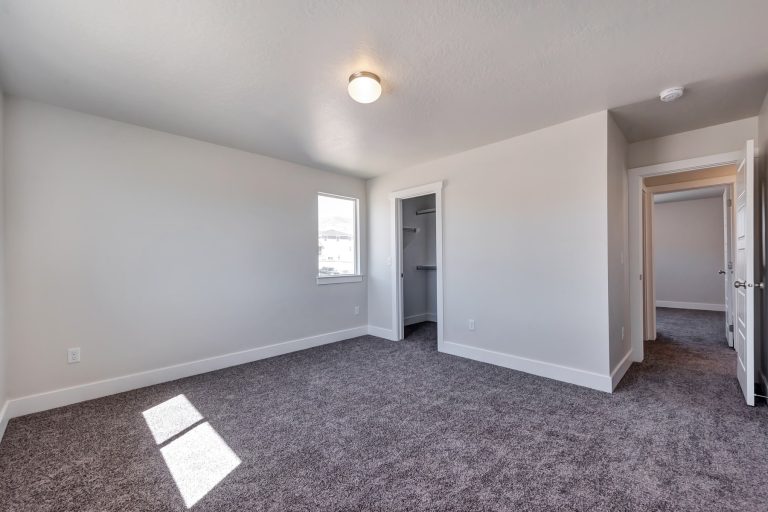 Bedroom in a new home from McArthur Homes.