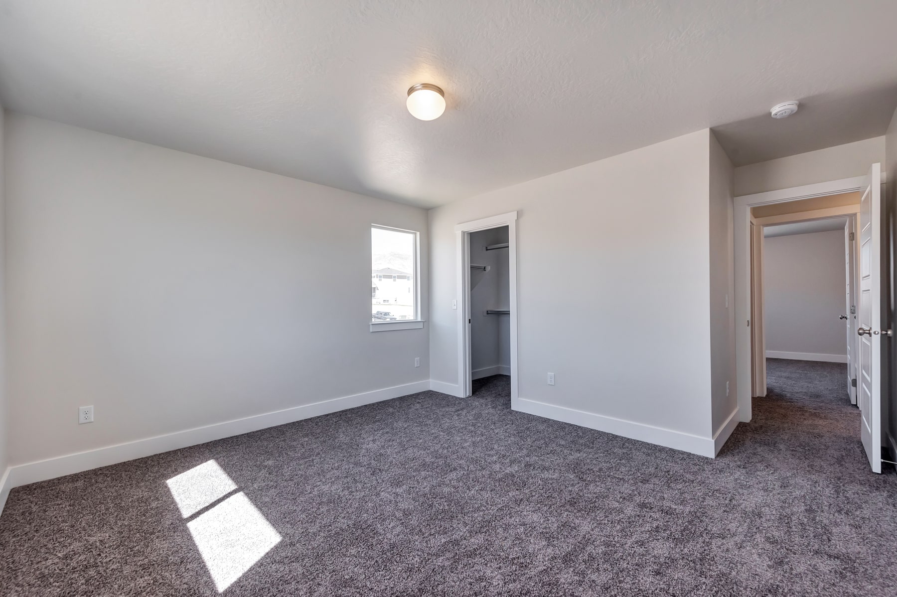 Bedroom in a new home from McArthur Homes.