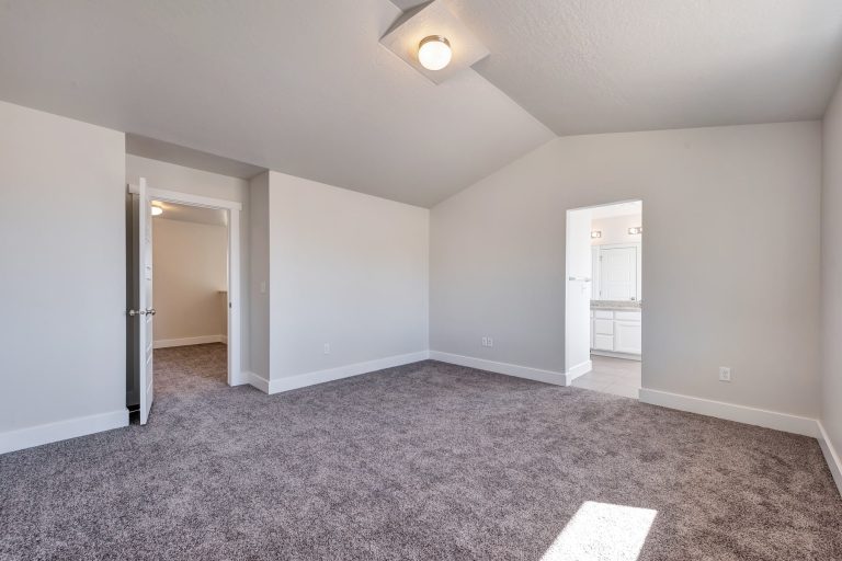 Master bedroom in a new home from McArthur Homes.