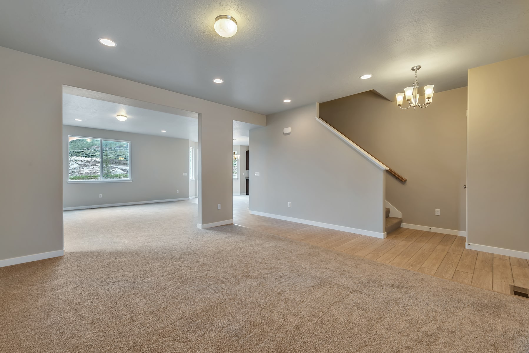 Gathering area and stairs in a new home from McArthur Homes.