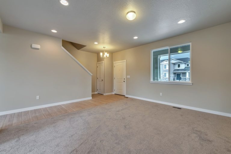 Front door and gathering area in a new home from McArthur Homes.