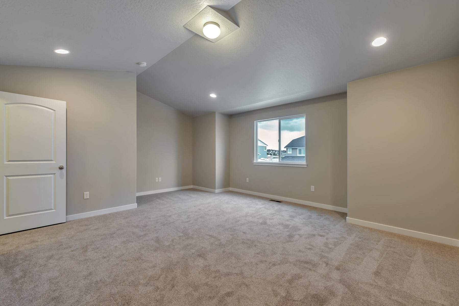 Gathering area or bedroom in a new home from McArthur Homes.
