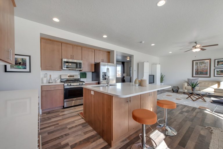 Kitchen area with brown cabinets from mcarthur homes