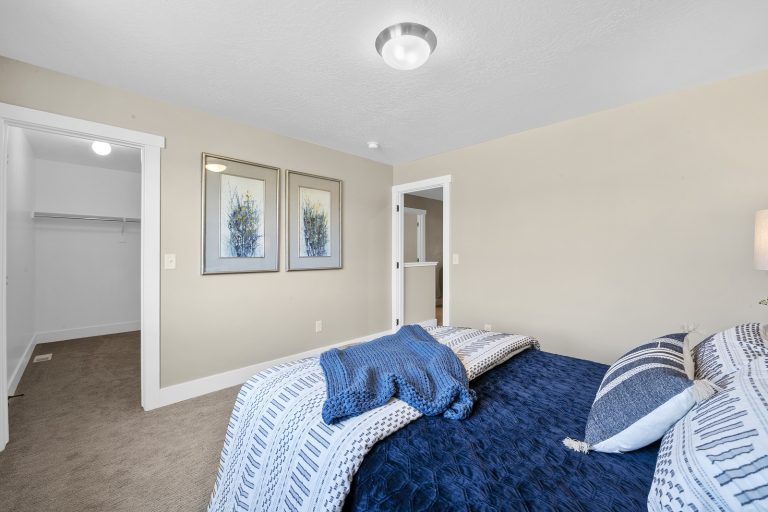 Bedroom in a new home from McArthur Homes.