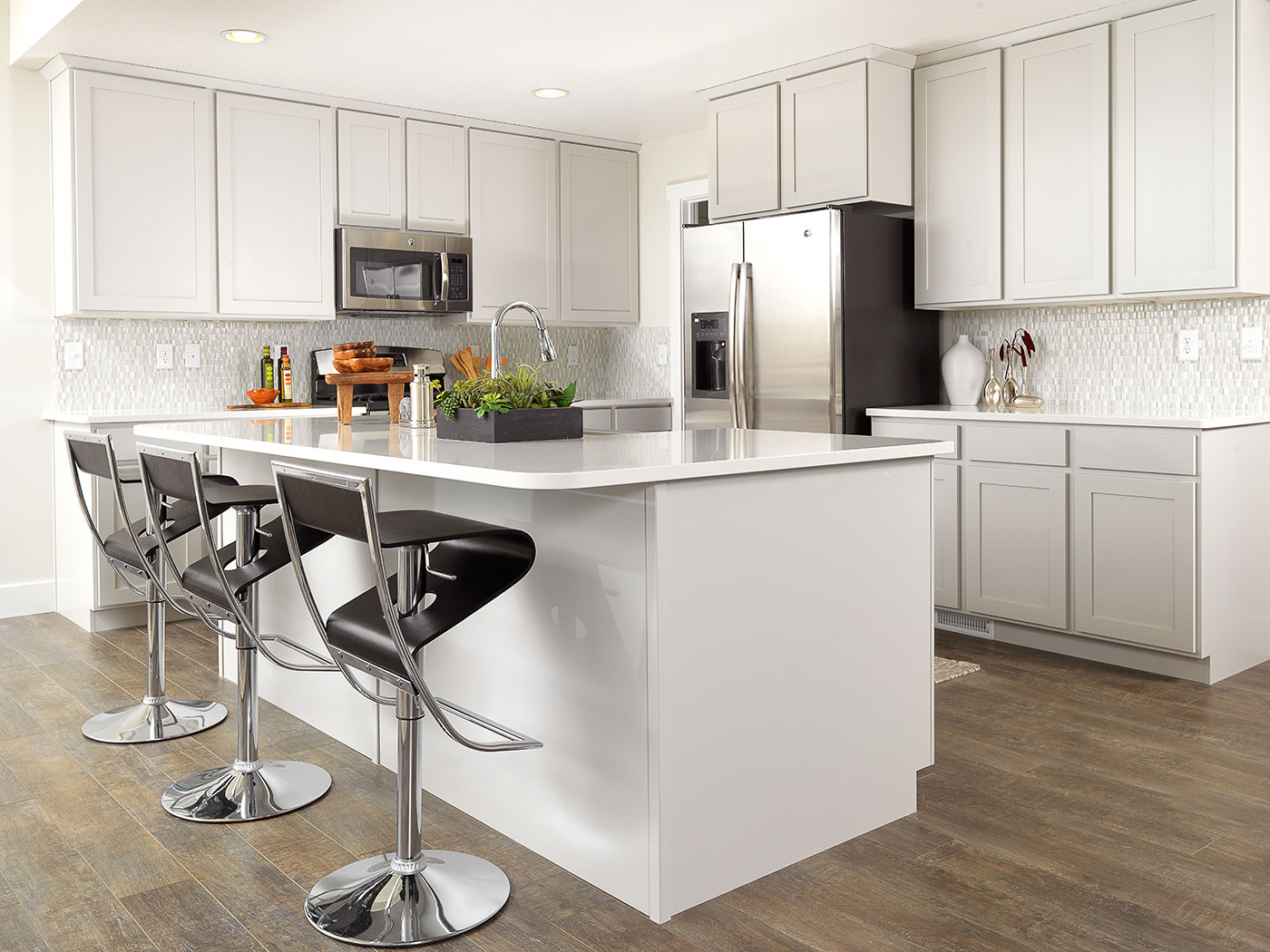 a completed and furnished kitchen built by McArthur Homes