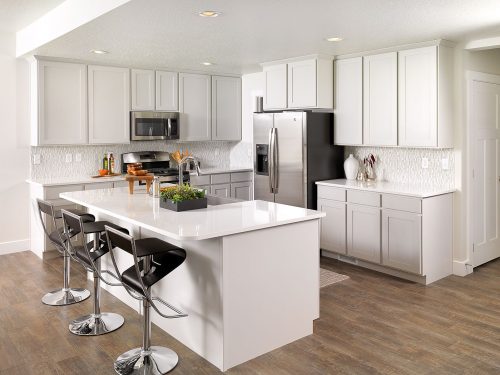 a completed and furnished kitchen built by McArthur Homes