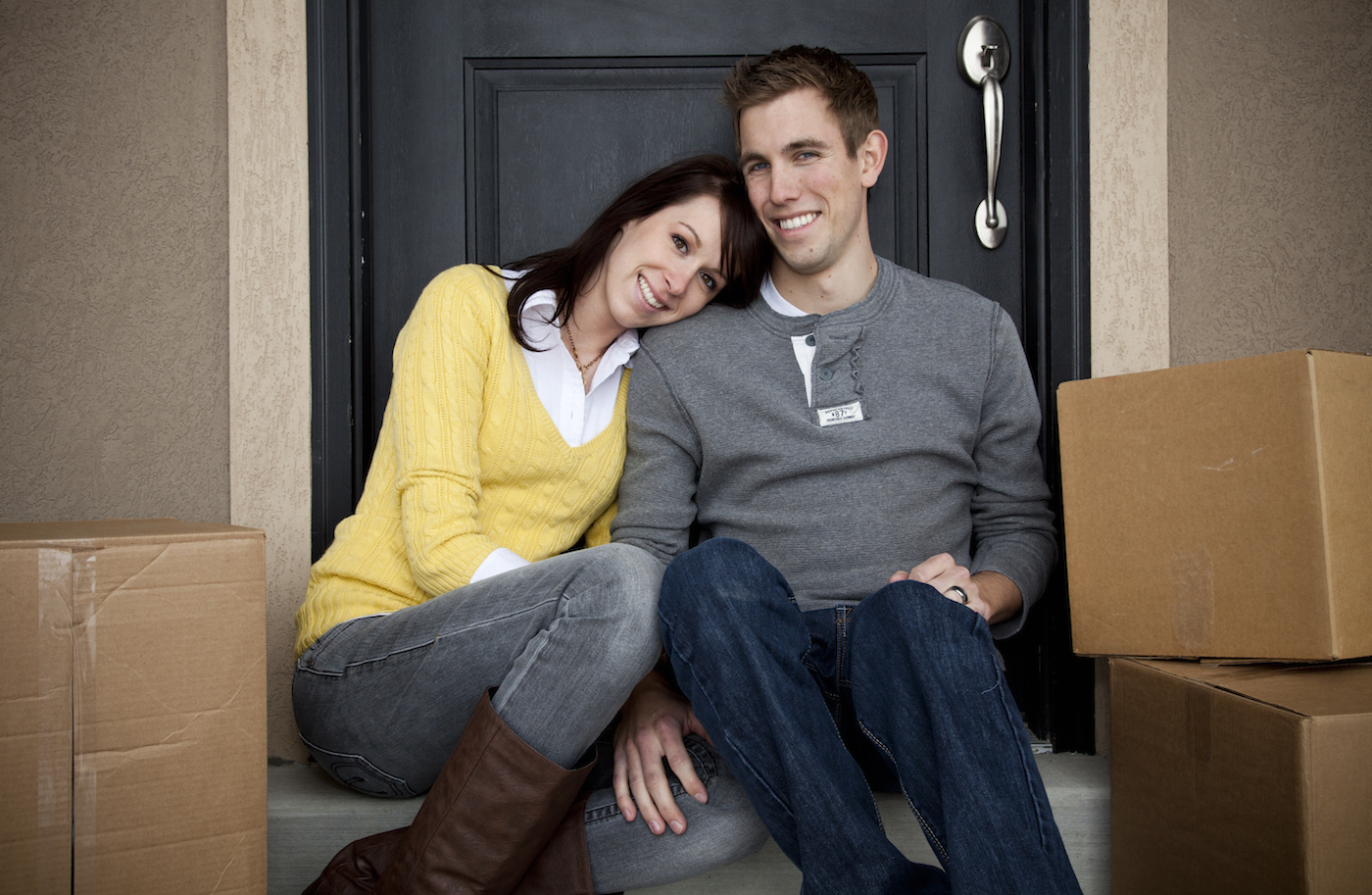 Young couple moving into their home built by McArthur Homes