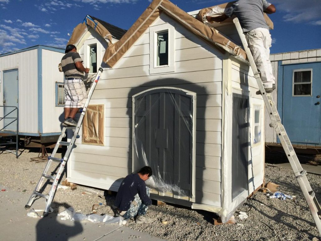 men building a playhouse