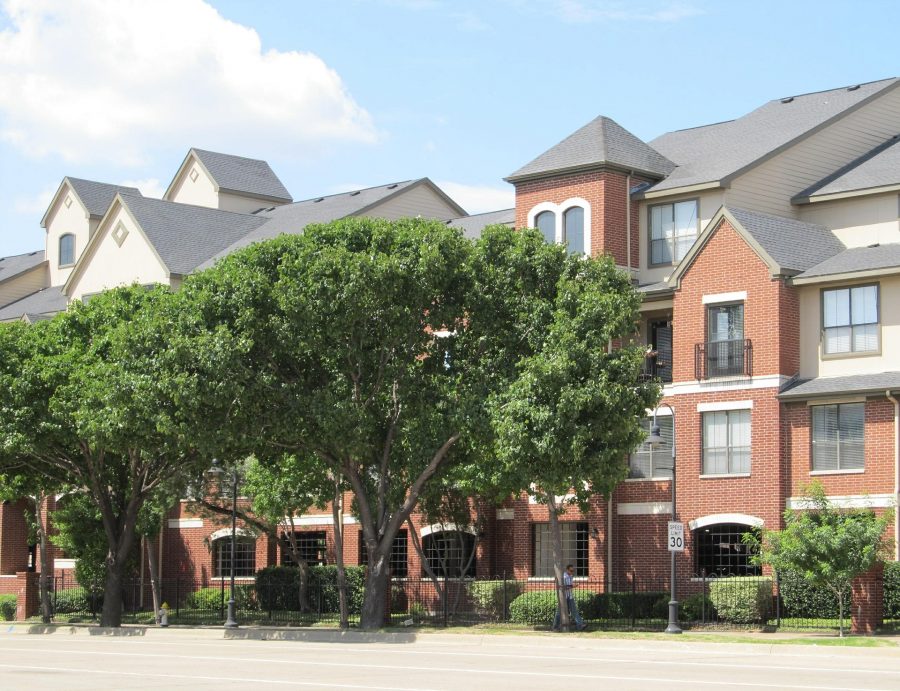 A series of townhomes next to the road