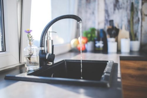 Water running out of a faucet