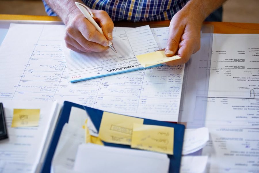 Man reviewing financial paperwork