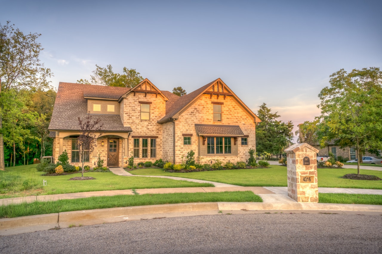 A gorgeous brick home at sunset