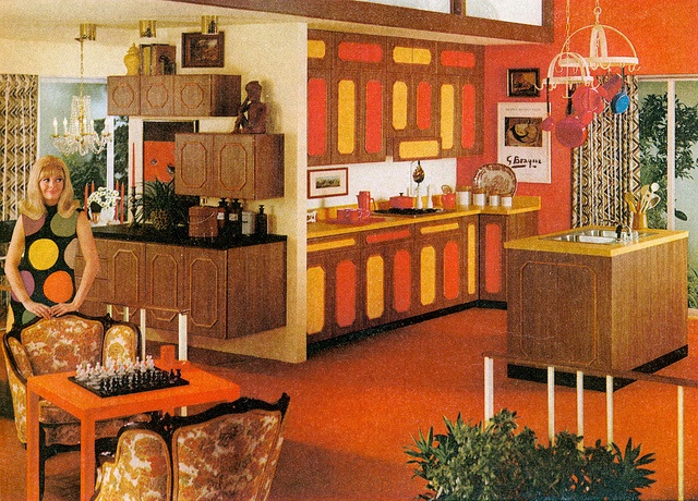 60s home interior with orange walls and carpeting