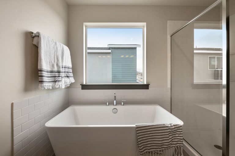 Tub in a bathroom Inside A New Home From McArthur Homes