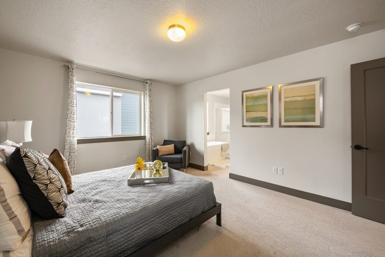 Bedroom with bathroom attached Inside A New Home From McArthur Homes