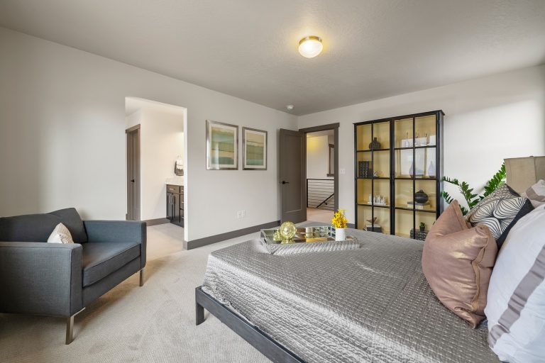 Large bedroom with bathroom attached Inside A New Home From McArthur Homes