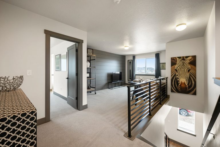 Loft area with carpet and living area Inside A New Home From McArthur Homes