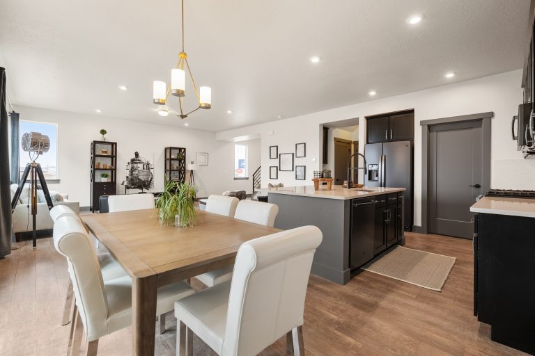 Open Concept Kitchen and Gathering Area Inside a New Home From McArthur Homes