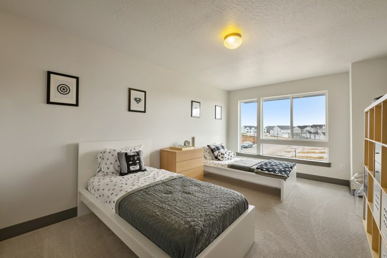 children's bedroom with two beds Inside A New Home From McArthur Homes