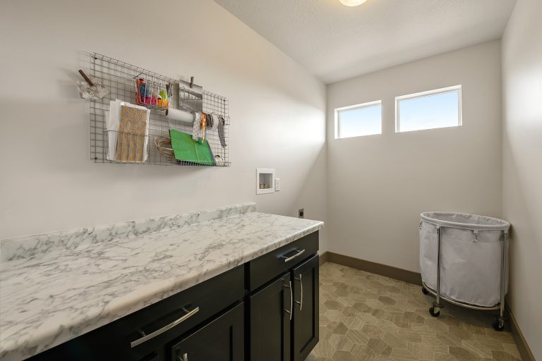 Laundry room with machines not installed Inside A New Home From McArthur Homes