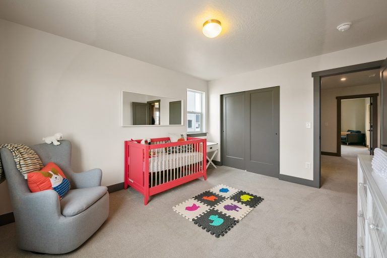 babys bedroom with a crib Inside A New Home From McArthur Homes