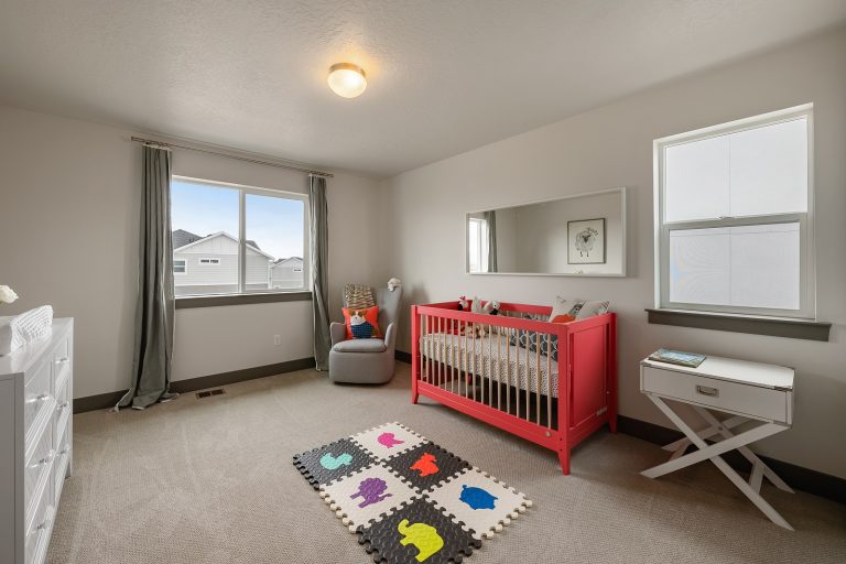 Babys bedroom with crib Inside A New Home From McArthur Homes