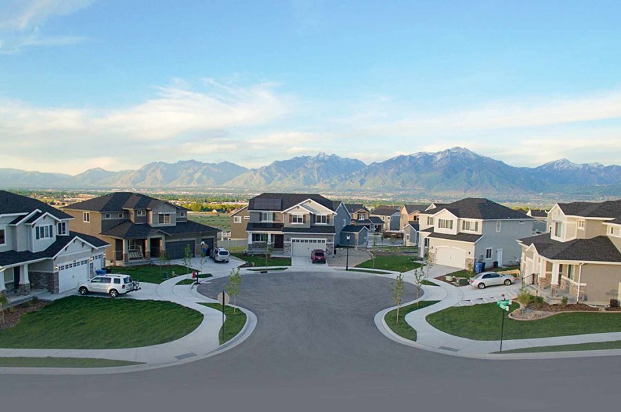 Street with custom mcarthur homes on it