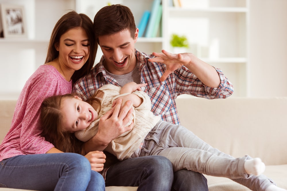 Family Playing Together in New Home