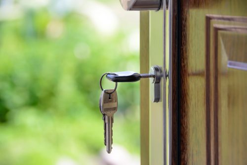 Key In Door Of New Home