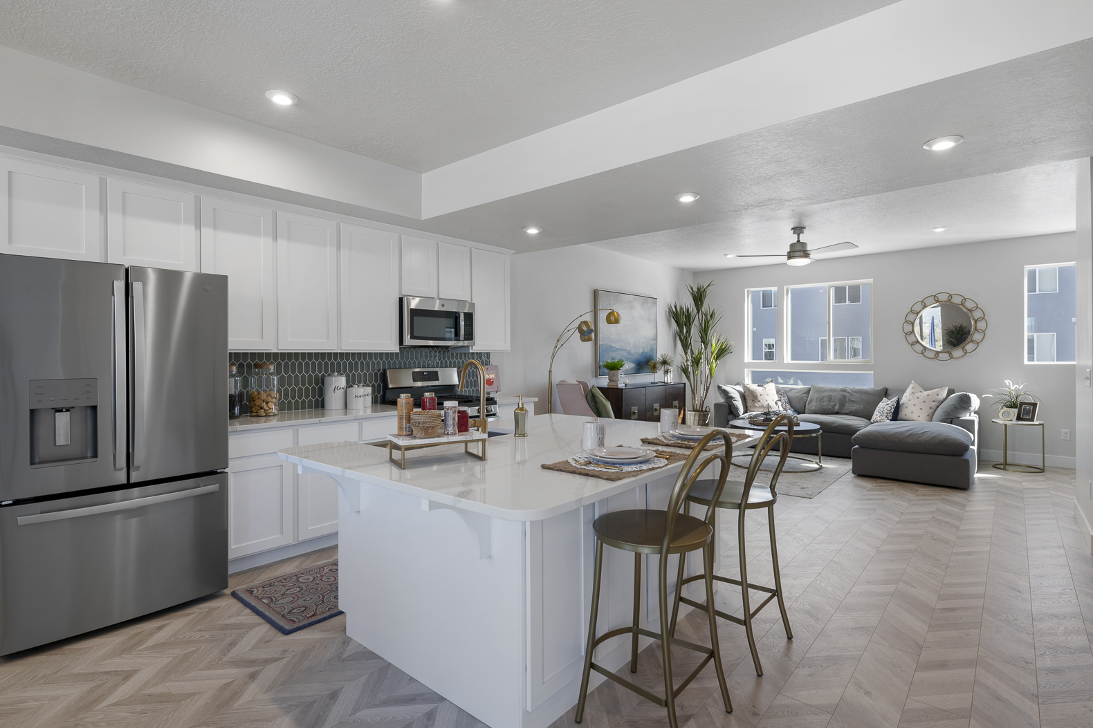 Kitchen with island in a new home from McArthur Homes.