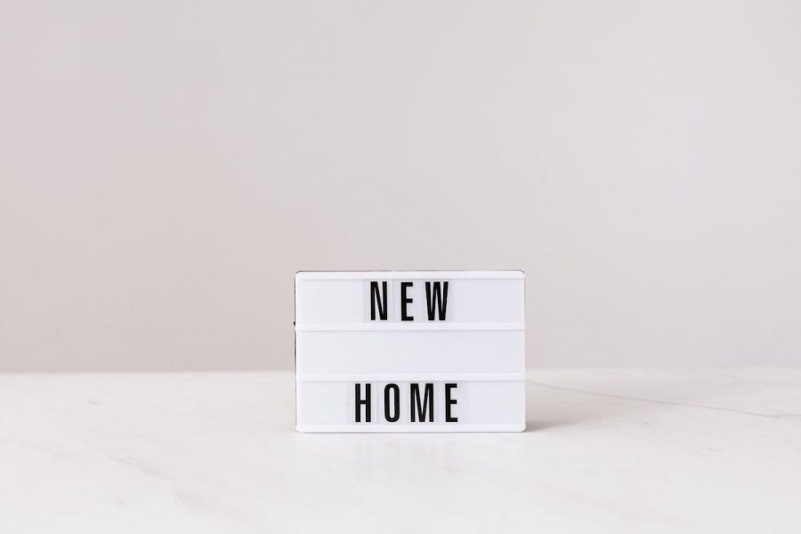 New Home Written on a Sign
