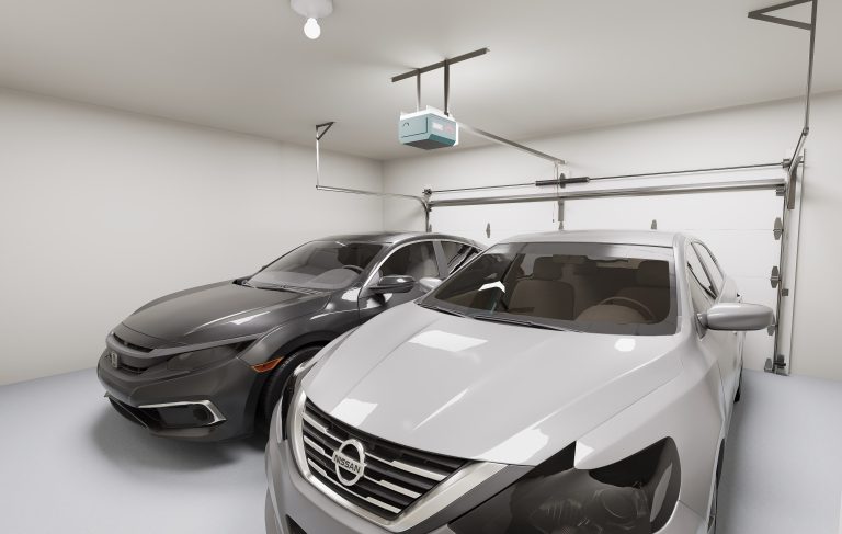Two cars parked side by side in a clean, modern garage with white walls and ceiling, often found in homes in Utah. The space features ceiling lights, an automatic garage door opener, and a closed overhead door for added convenience.