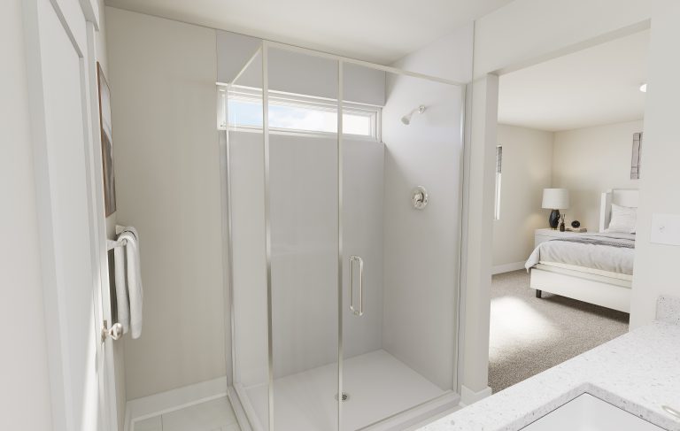 A modern glass shower enclosure with a door in a bright bathroom, adjacent to a bedroom with a white bed, nightstand, and lamp—showcasing the airy style often found in homes in Utah. Natural light enters through a high horizontal window.