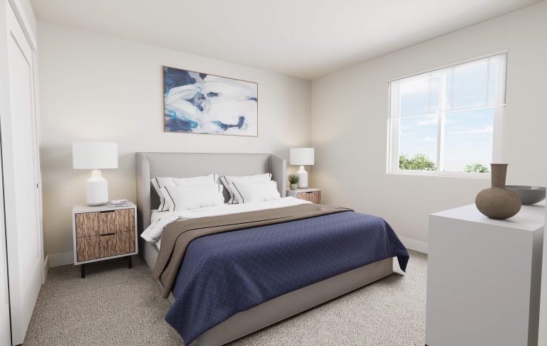 A bright, modern bedroom inspired by homes in Utah features a neatly made bed with a blue blanket, two wooden nightstands with lamps, a dresser with vases, and a large window letting in natural light. Abstract art hangs above the bed.