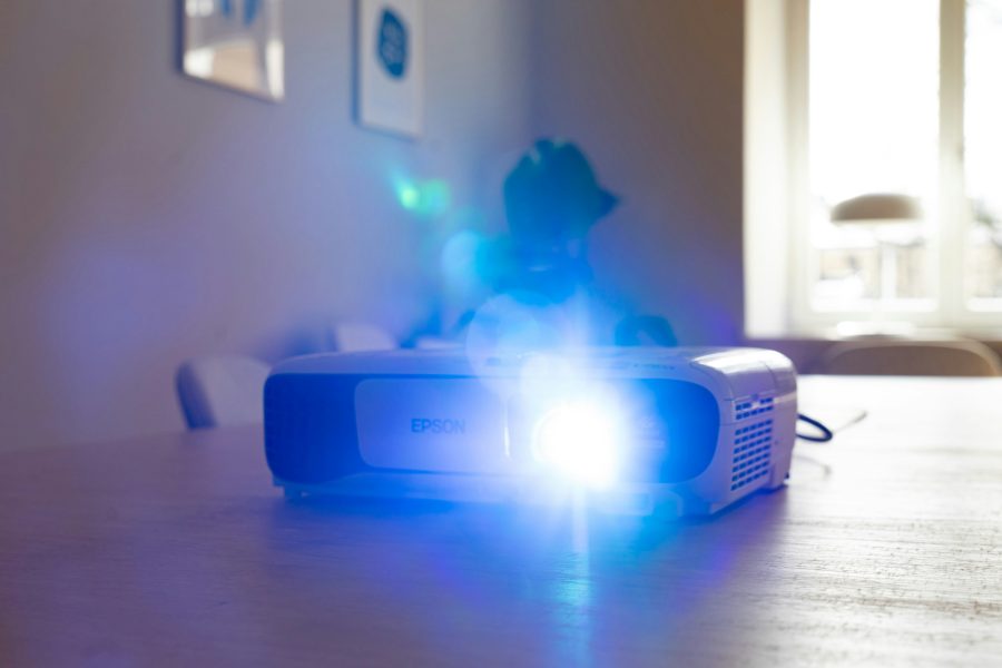 A movie projector shines bright.