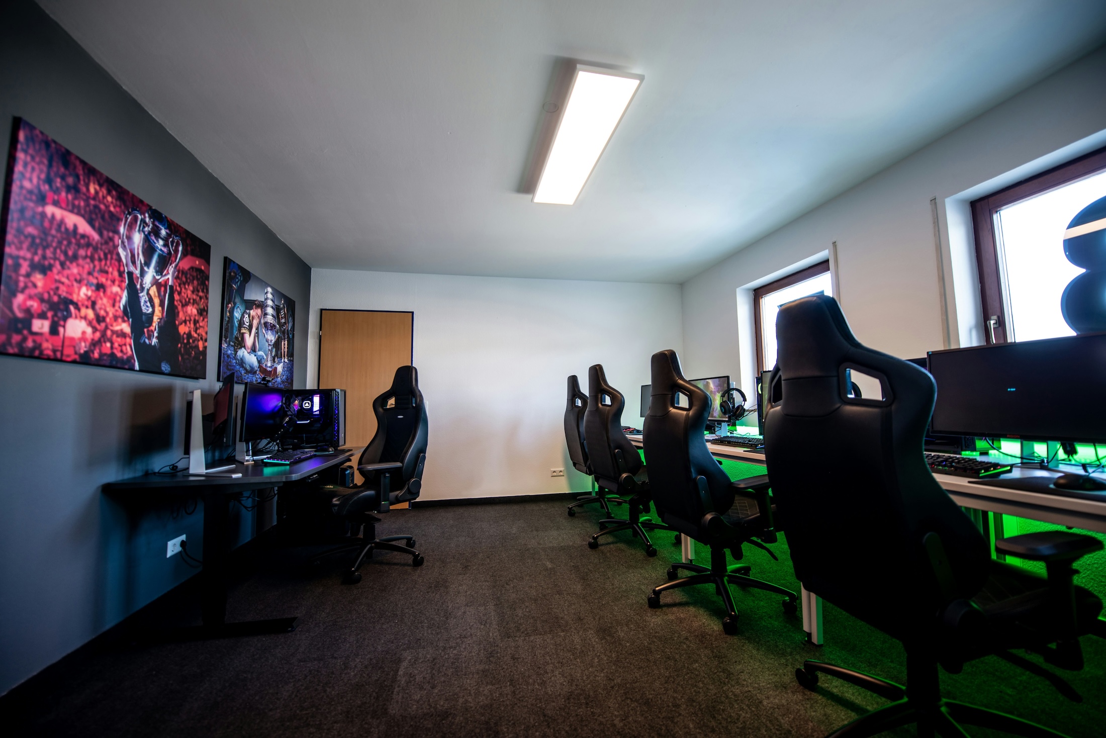 Room set up with multiple gaming stations in a new home